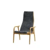 Lamini Children's armchair, Sheepskin charcoal, oiled oak
