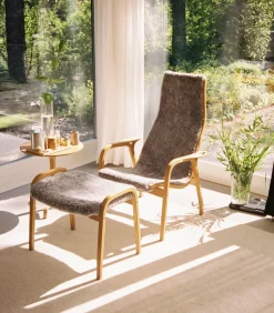 Lamino armchair and footstool oiled oak/sheepskin, Sahara (nougat-brown)